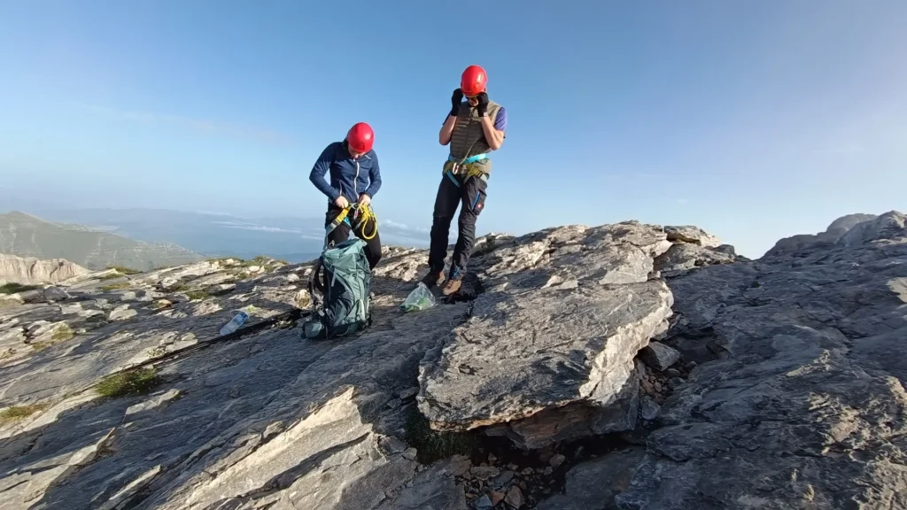 Hikers progressing along the Easy Trail route on Mount Olympus