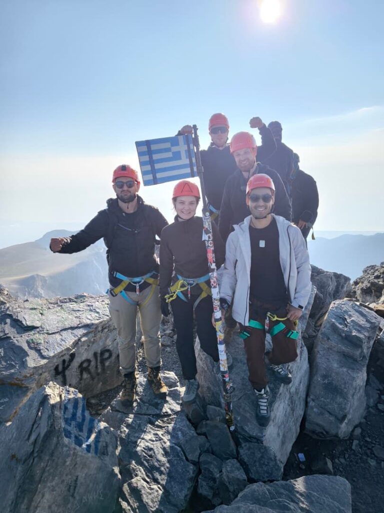 Hikers enjoying the summit atmosphere during the Easy Trail Olympus Summit experience
